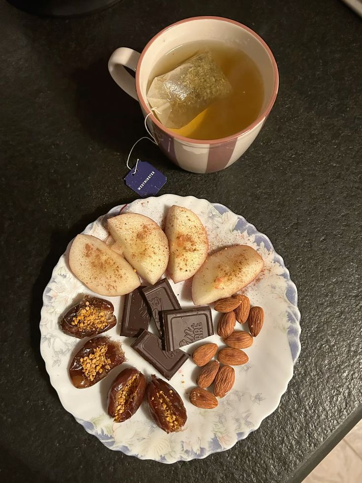 Sleep promoting foods including chamomile tea almonds bananas and healthy snacks